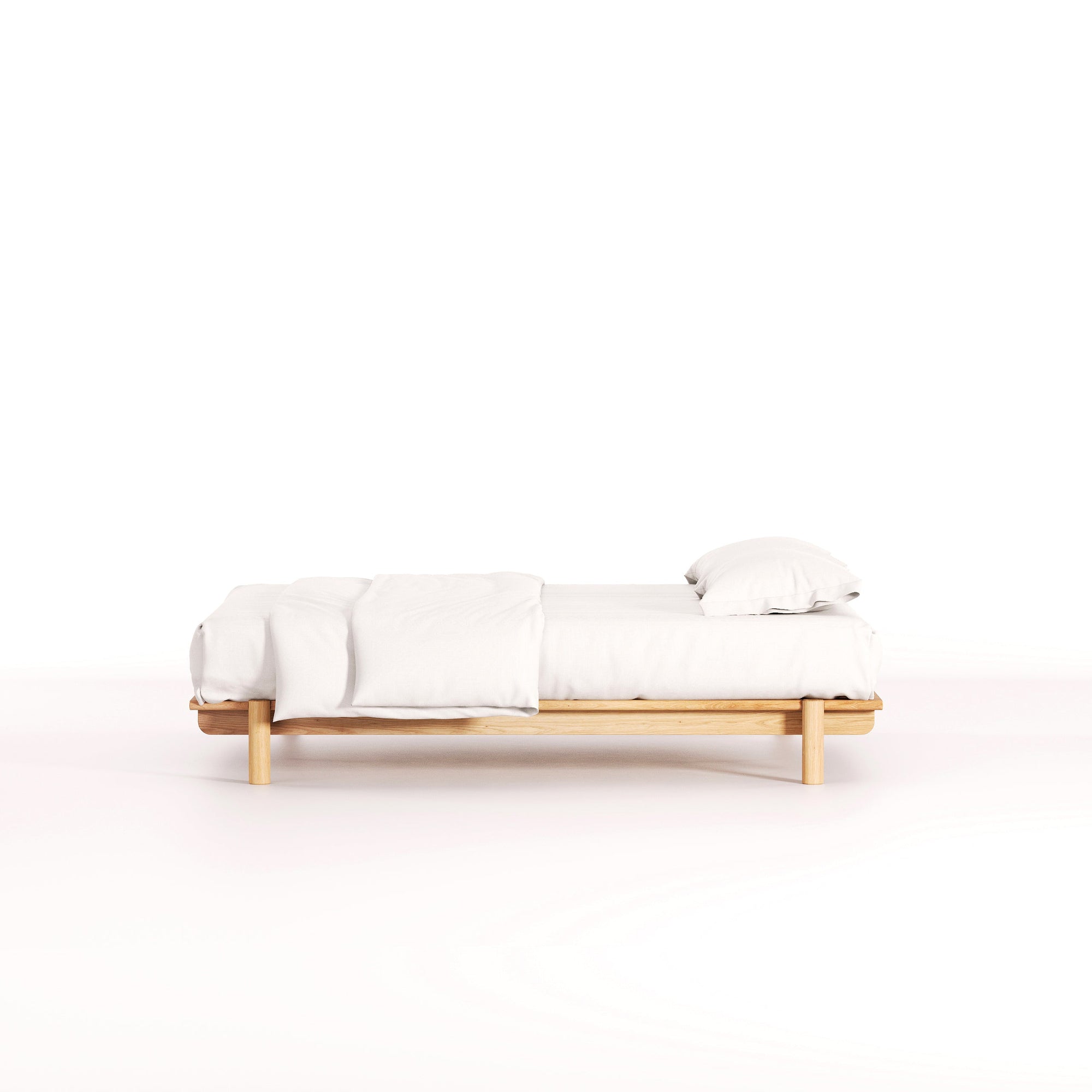 A beautiful, modern, timber platform bed made in Australia by Mast Furniture